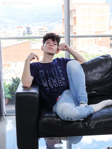 Curly boy with a smooth cock and ass