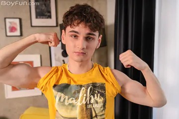 Ripped twink with a shaved cock