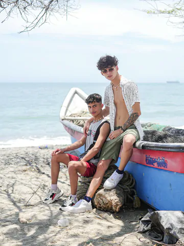 Two Latino gay boys in action