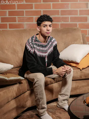 Curly boy with a shaved cock