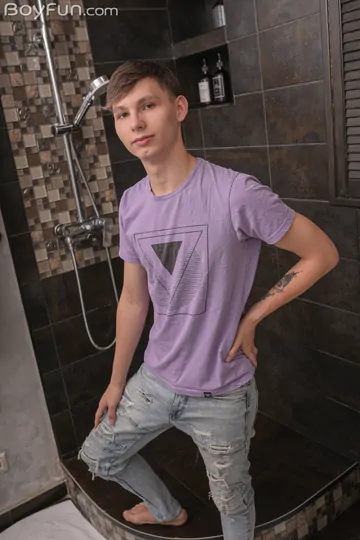 Handsome boy with a cut cock
