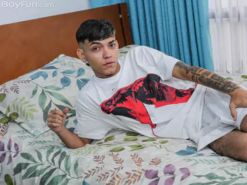 Handsome tattooed Latino boy