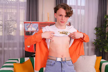 Handsome twink showing hard cock