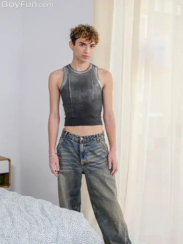 Curly boy showing his goods