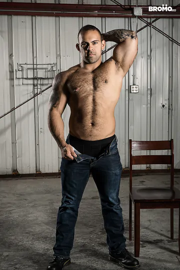 Two dudes fucking in a warehouse