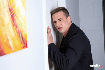 Tied up man watching guys fuck