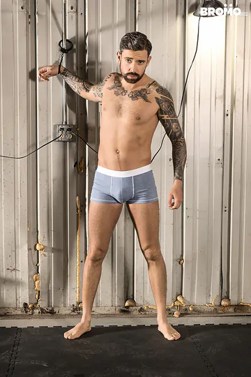 Two guys fucking in a warehouse