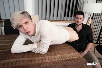 Blonde boy getting fucked on a table