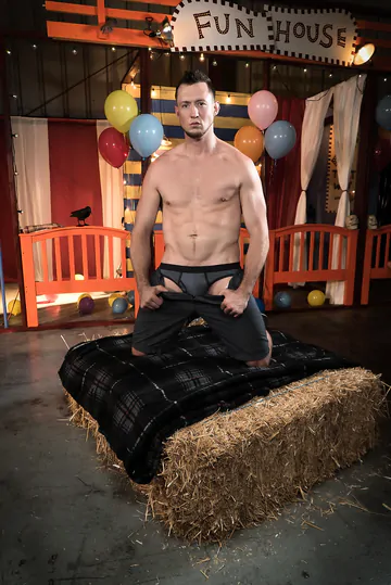 Porn stars fucking on a hay bale