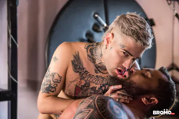 Sexy blonde tattooed guy fucking