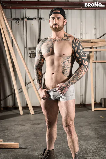 Rugged men in a warehouse fucking