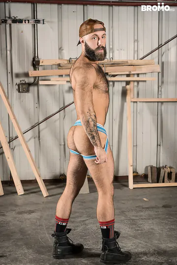 Rugged men in a warehouse fucking
