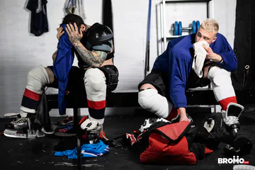 Men in sports gear having sex