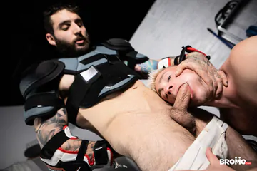 Men in sports gear having sex