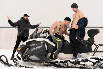 Snowmobile guys having a threesome