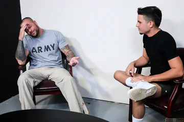 Tattooed man fucking a sexy guy