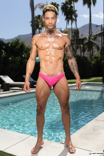 Tattooed guys having sex in a garden