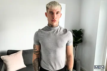 Tattooed guy wanking his big dick
