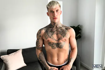 Tattooed guy wanking his big dick