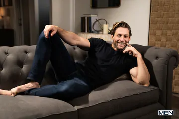 Gay guys on a sofa fucking