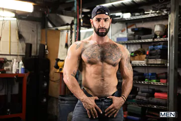 Rugged men fucking in the workshop