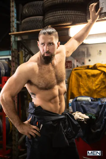 Rugged men fucking in the workshop