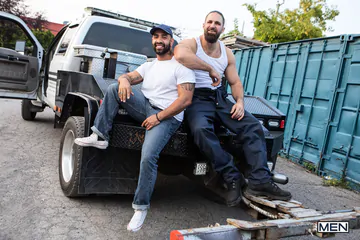 Rugged men fucking in the workshop