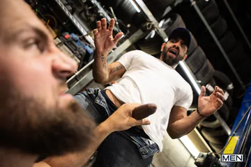 Rugged men fucking in the workshop