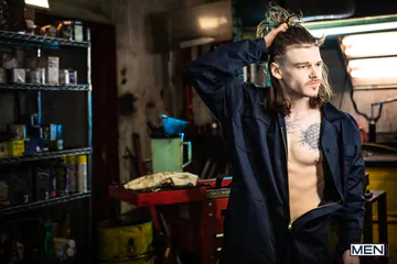 Tattooed guys fucking in a garage