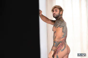 Tattooed gay men fucking