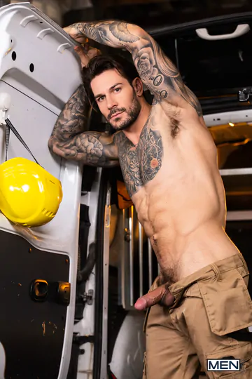 Gays in a van having sex