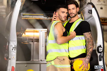 Gays in a van having sex