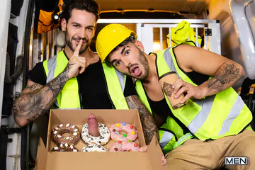 Gays in a van having sex