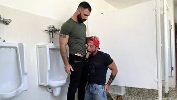 Men fucking in a public restroom