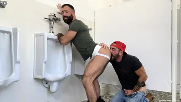 Men fucking in a public restroom
