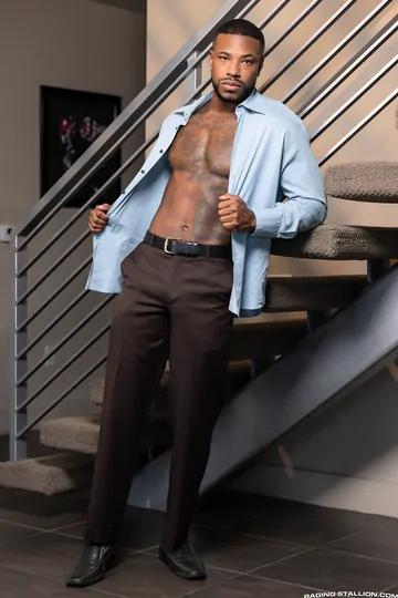 Men on a grey sofa fucking