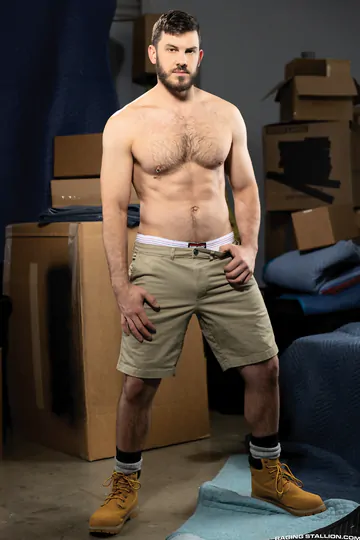 Men bareback fucking in a warehouse