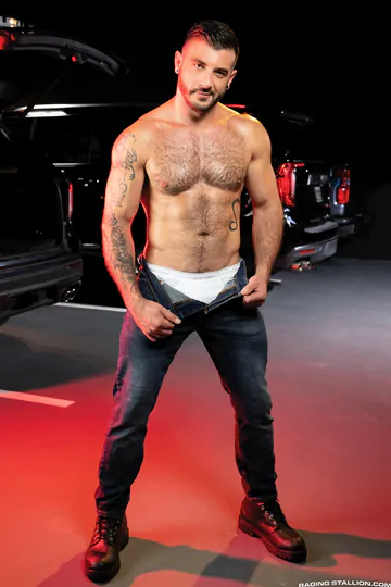 Men in a parking garage fucking