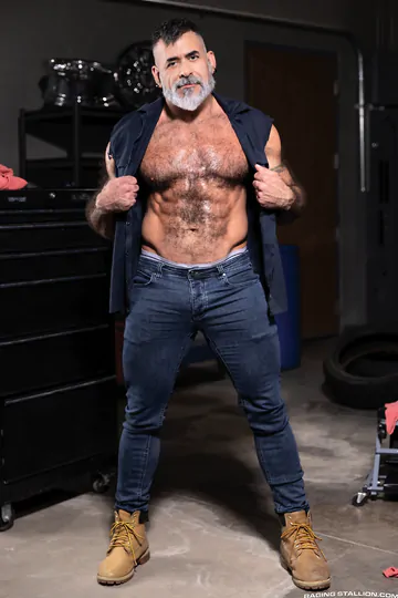 Rugged gays having a threesome