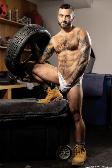 Hairy men in a workshop fucking