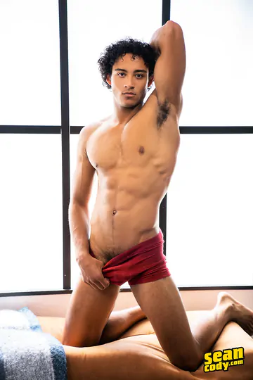 Interracial couple having sex