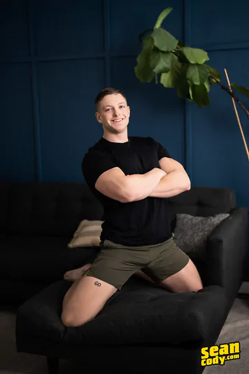 Hunks having sex on a sofa