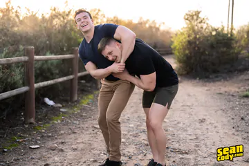 Hunks having sex on a sofa