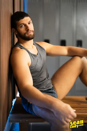 Muscular guys in a locker room