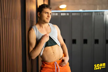 Muscular guys in a locker room