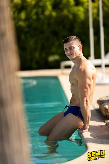 Guys by a pool having sex