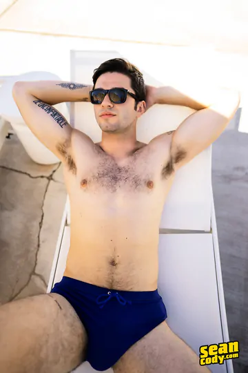 Guys by a pool having sex