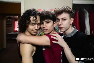 Boys in bed having a threesome