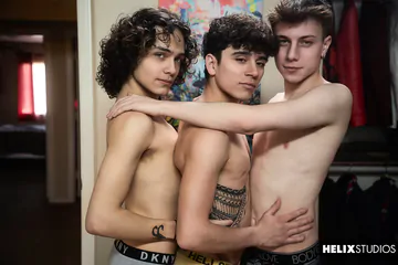 Boys in bed having a threesome