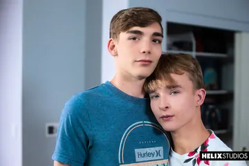 Gay twinks fucking on a sofa